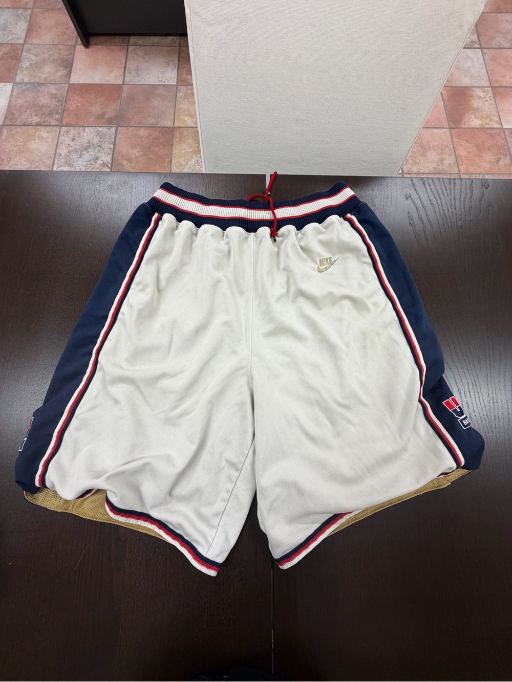 One pair of size large Nike basketball shorts